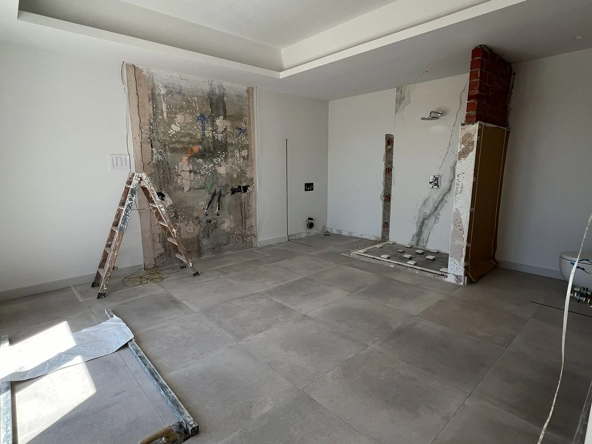 Bathroom during works, showing the vanity wall being reworked