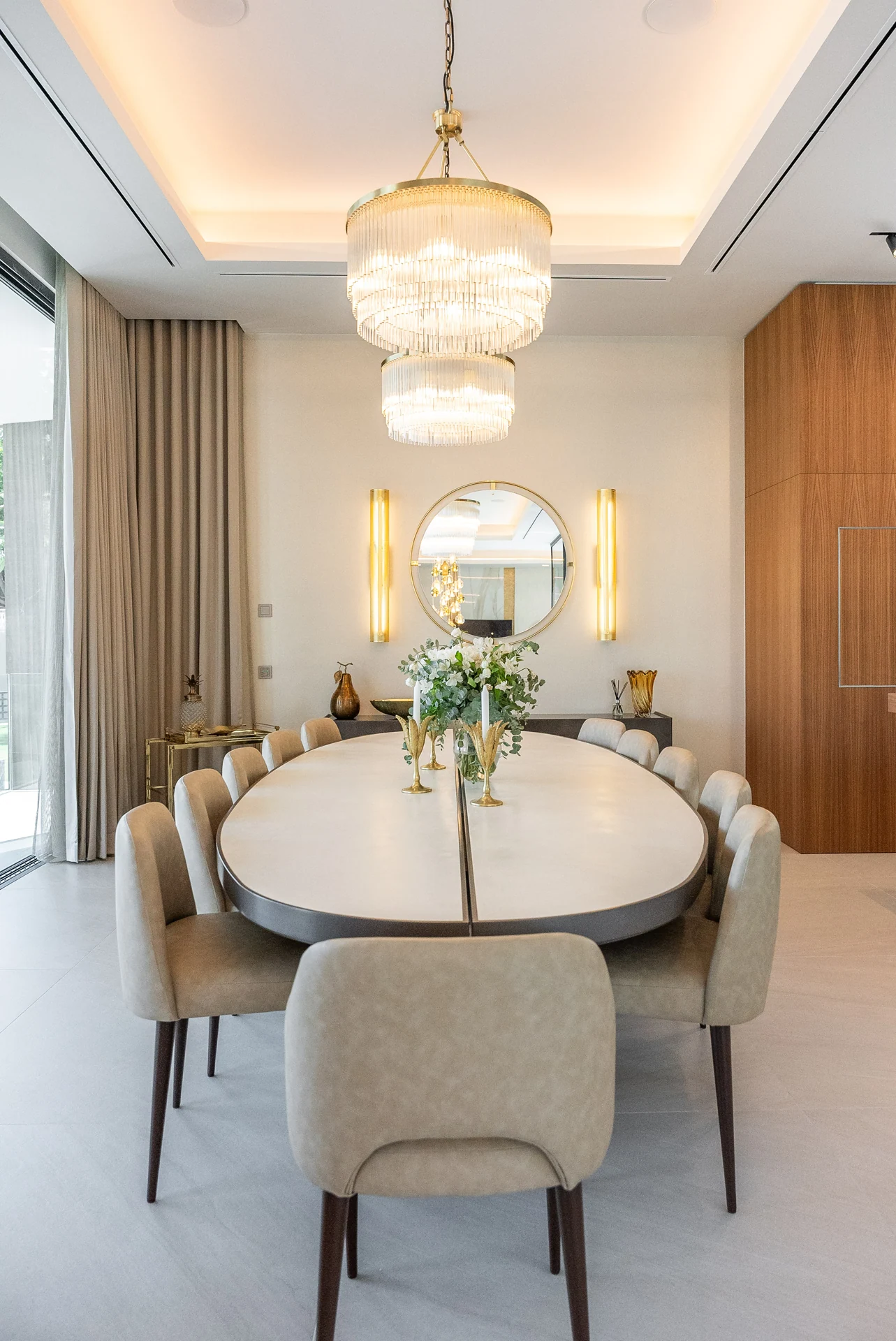 Dining room with upholstered chairs and pendant lights